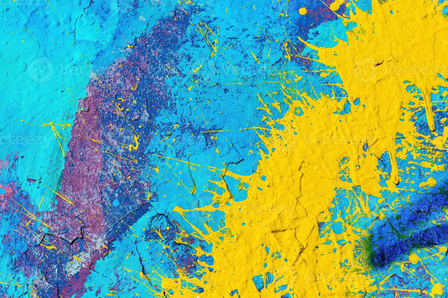A fragment of colorful graffiti painted on a wall. Abstract urban background. photo