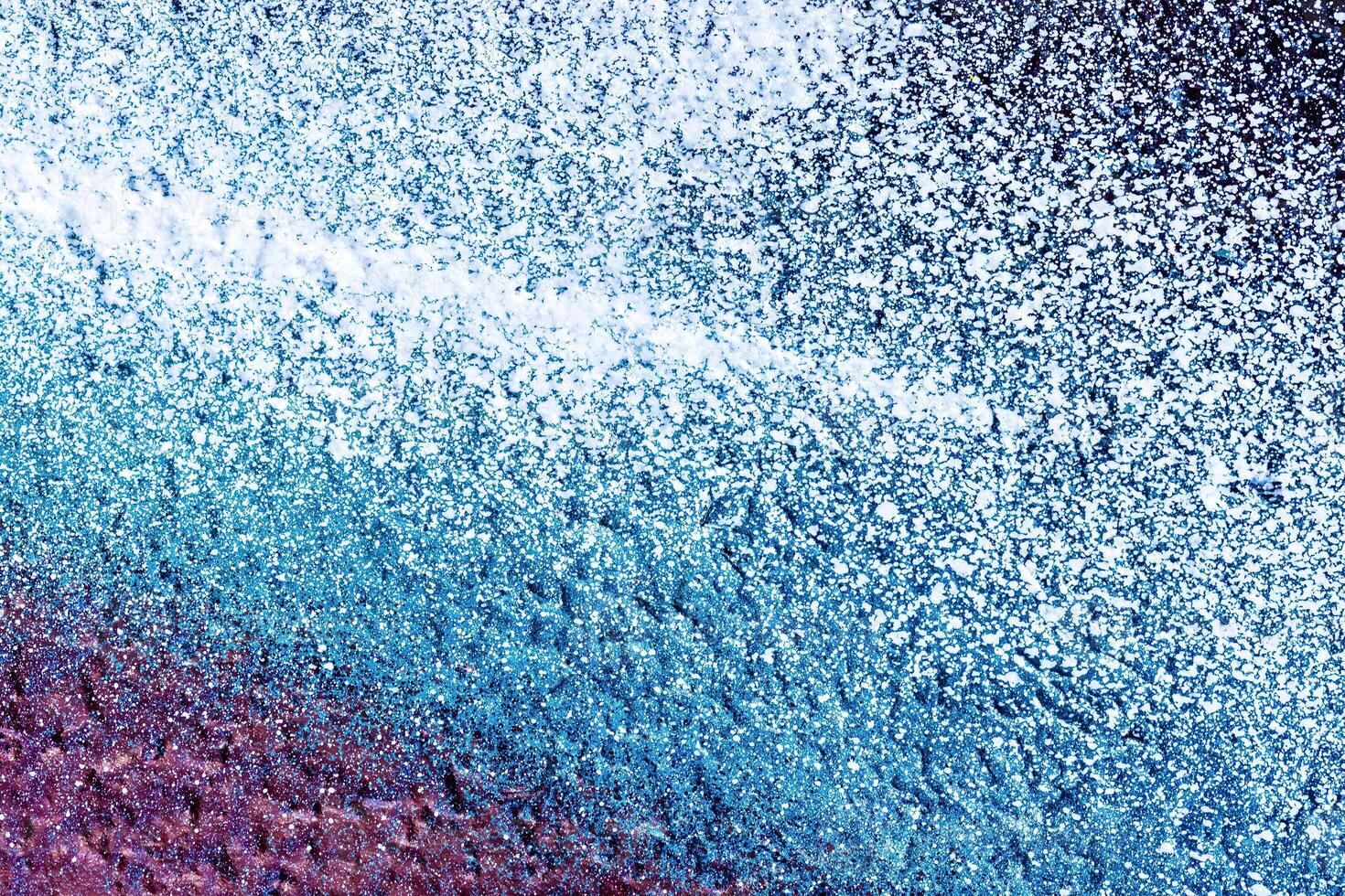 A fragment of colorful graffiti painted on a wall. Abstract urban background. photo