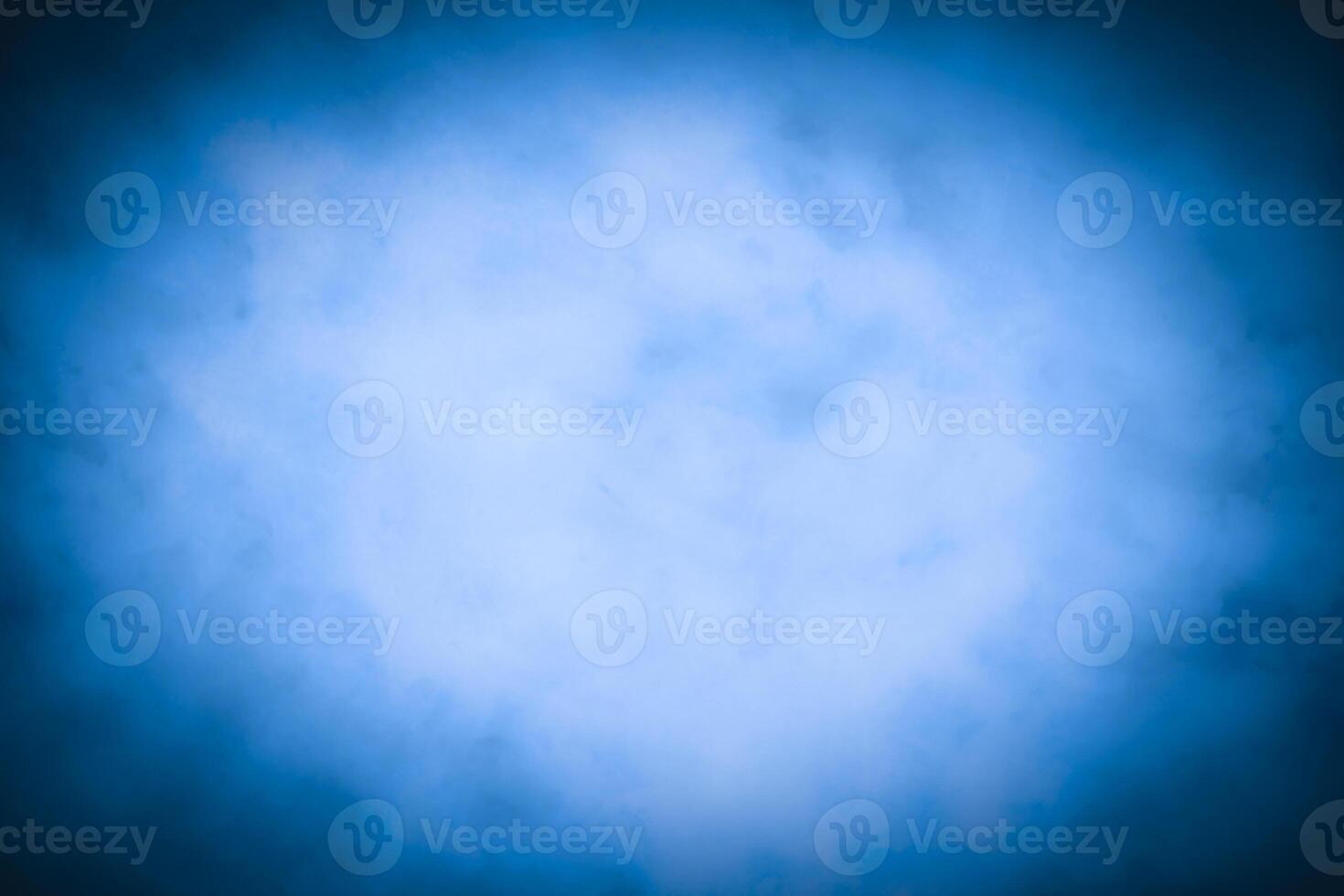 Blured blue decorative plaster or concrete background with vignette. photo