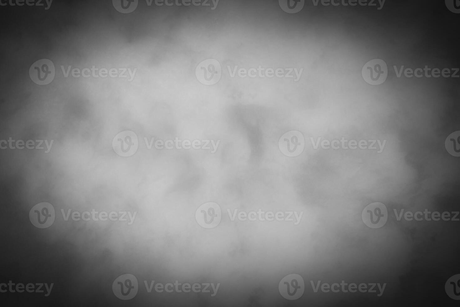 Blured gray decorative plaster or concrete background with vignette. photo