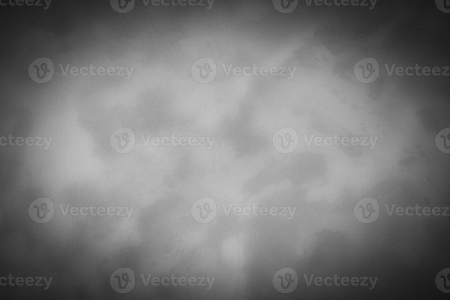 Blured gray decorative plaster or concrete background with vignette. photo