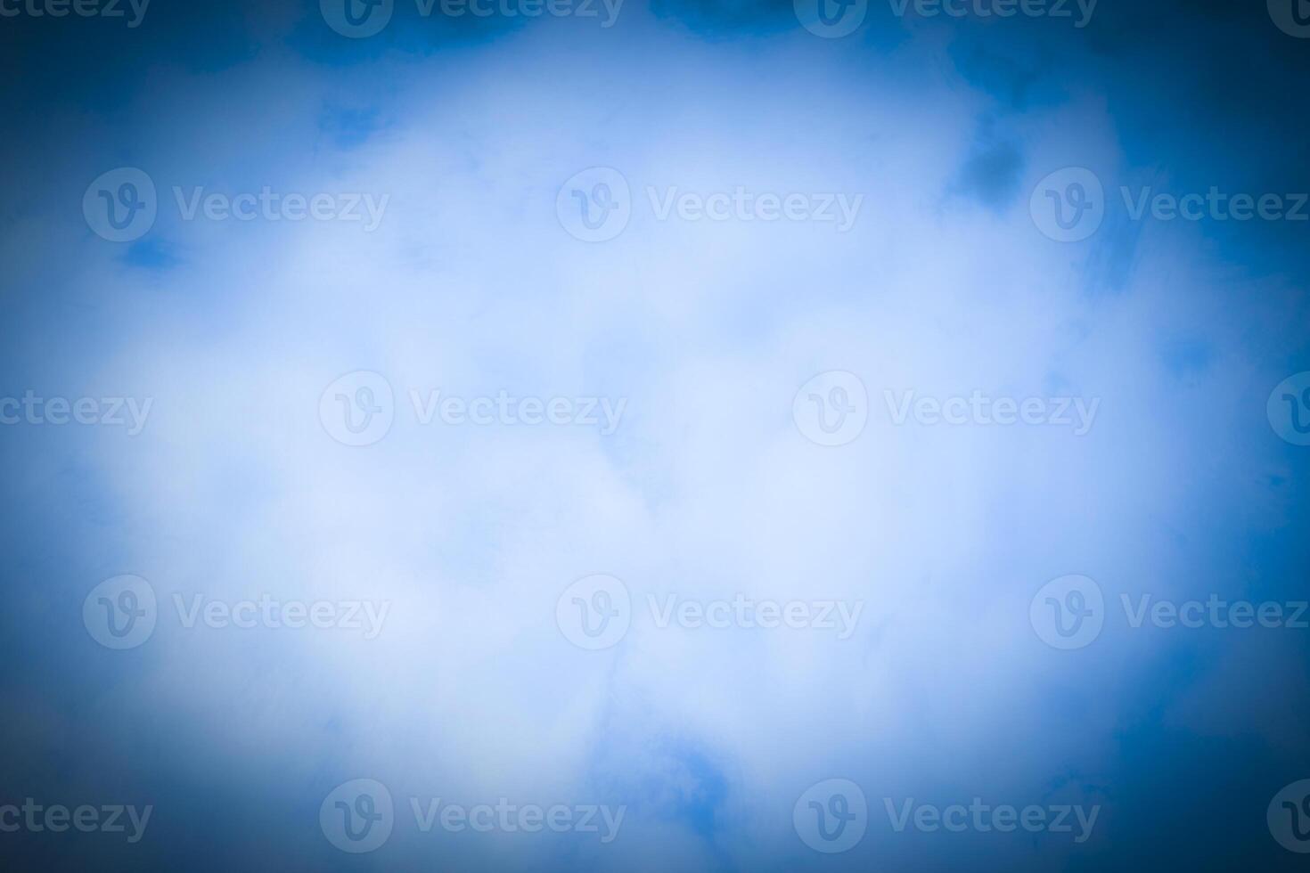 Blured blue decorative plaster or concrete background with vignette. photo