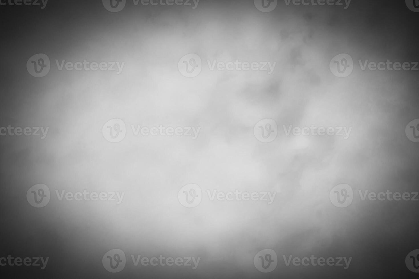 Blured gray decorative plaster or concrete background with vignette. photo