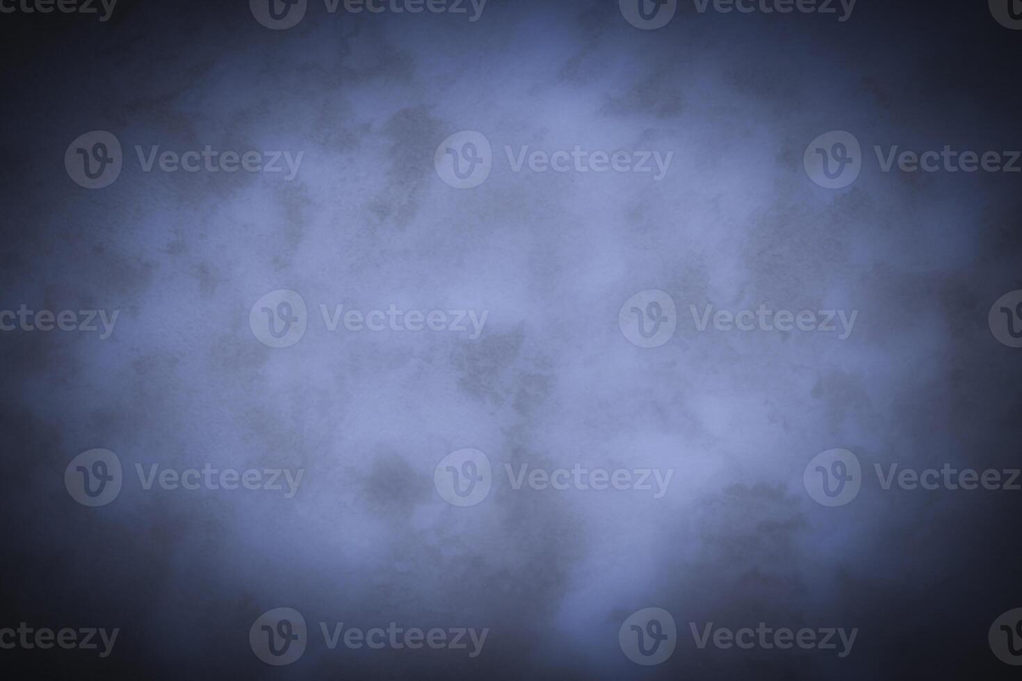 Blured monochrome decorative plaster or concrete background with vignette. photo