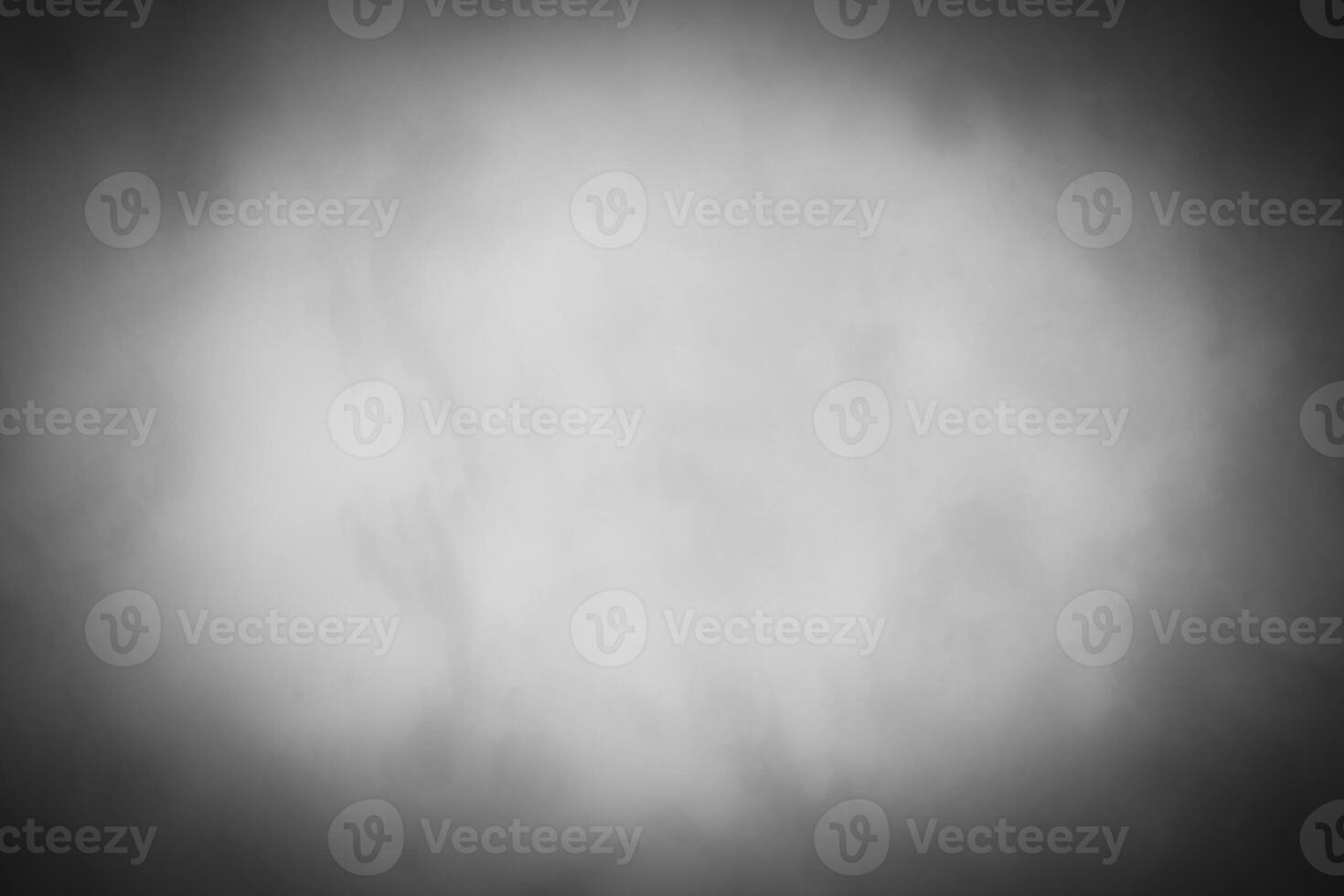 Blured gray decorative plaster or concrete background with vignette. photo