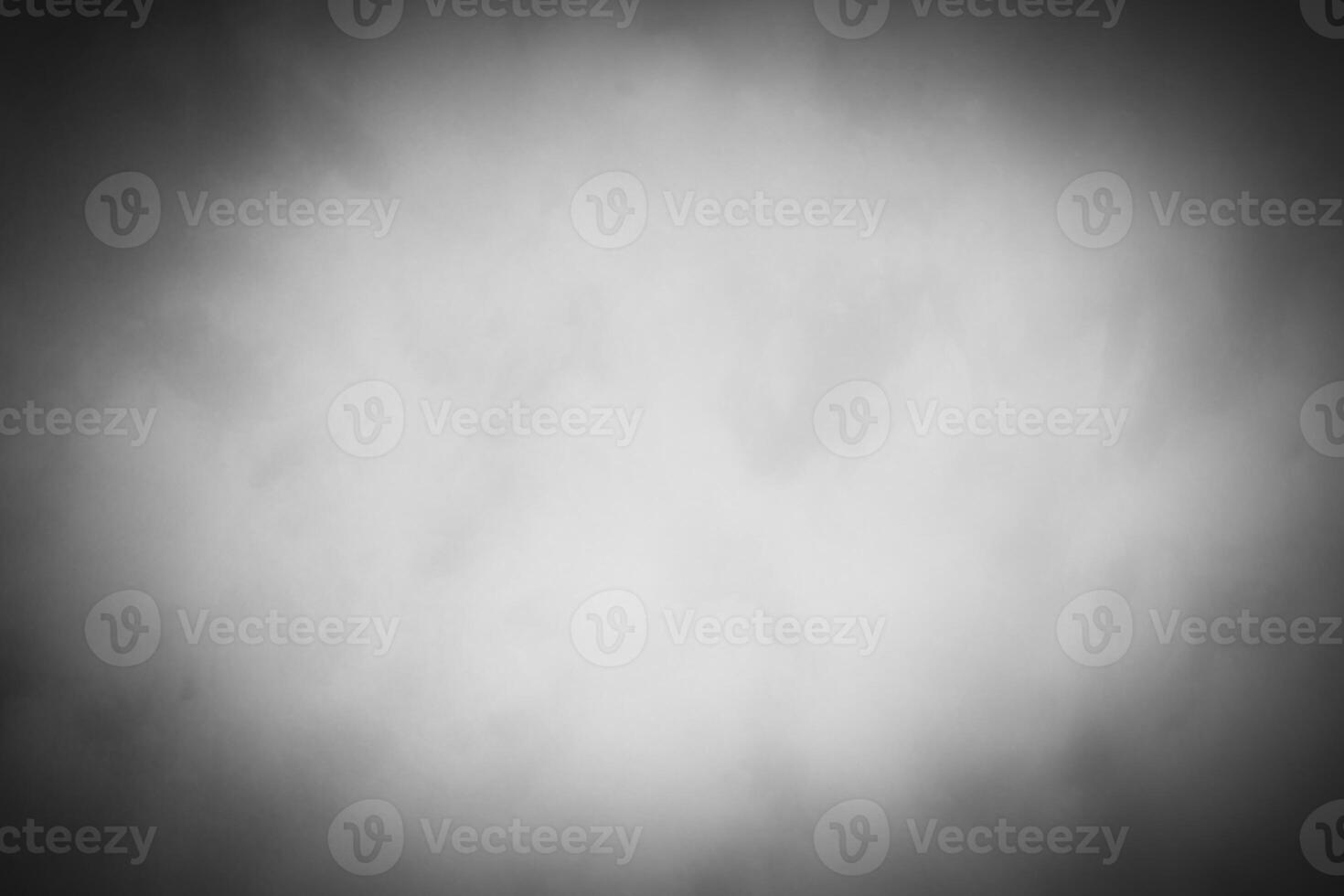 Blured gray decorative plaster or concrete background with vignette. photo