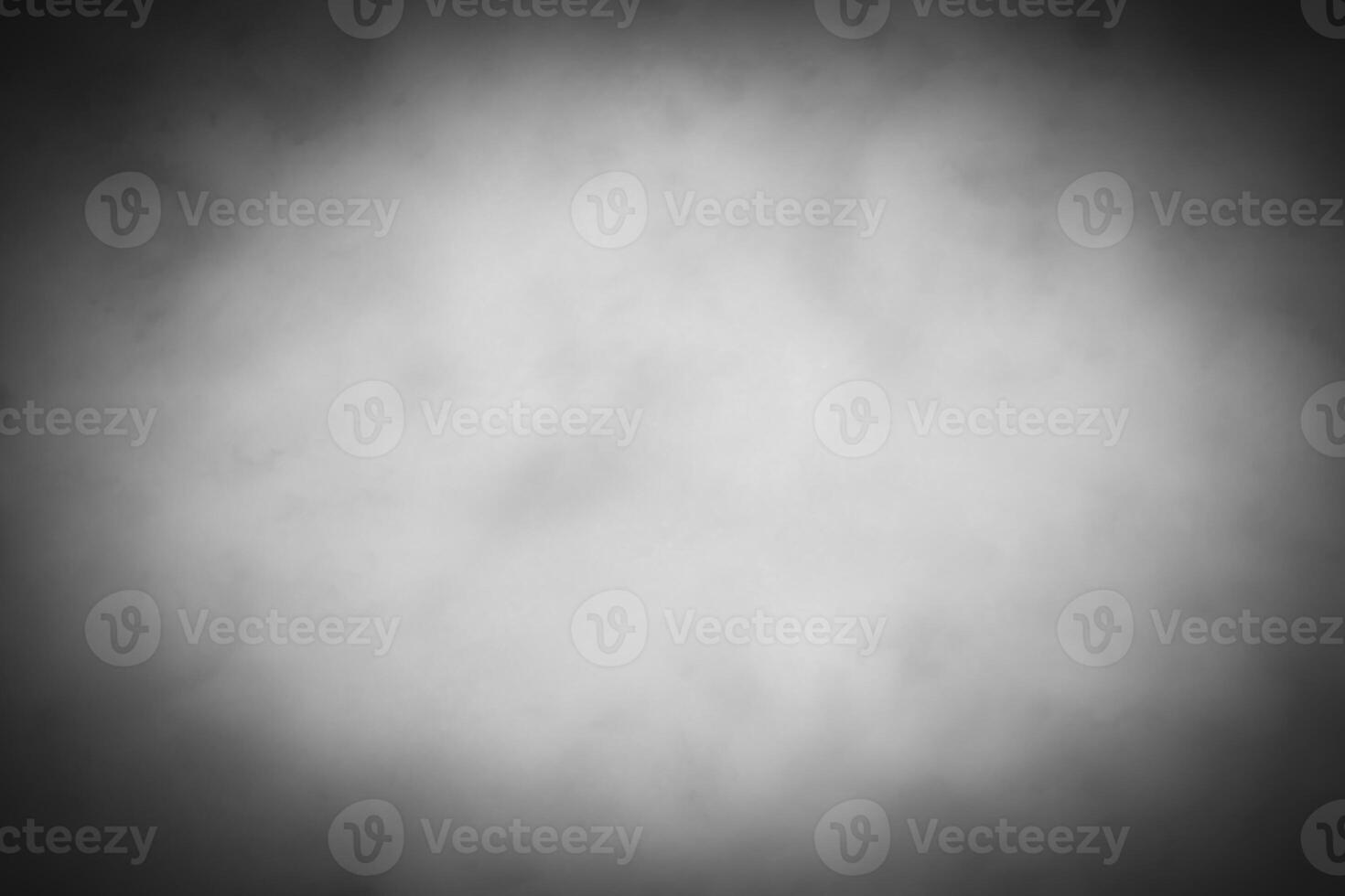 Blured gray decorative plaster or concrete background with vignette. photo