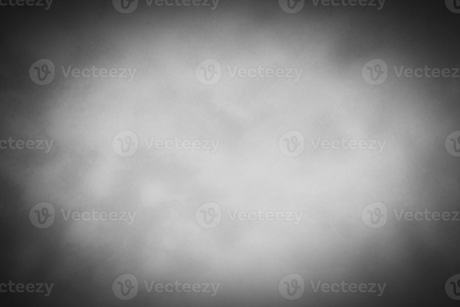 Blured gray decorative plaster or concrete background with vignette. photo