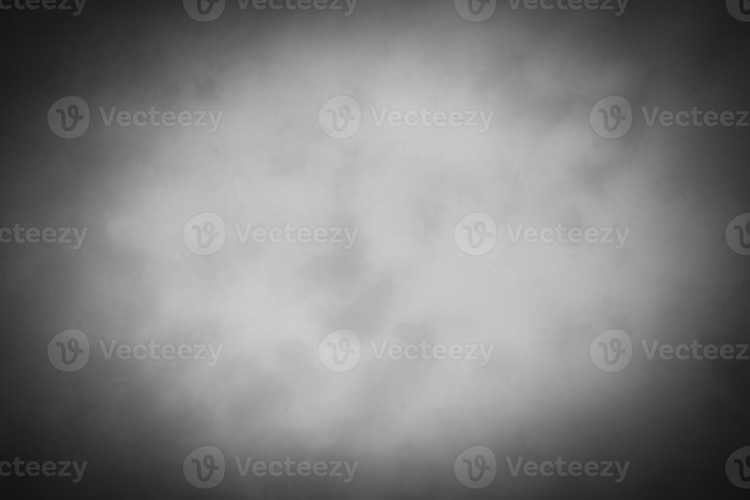 Blured gray decorative plaster or concrete background with vignette. photo