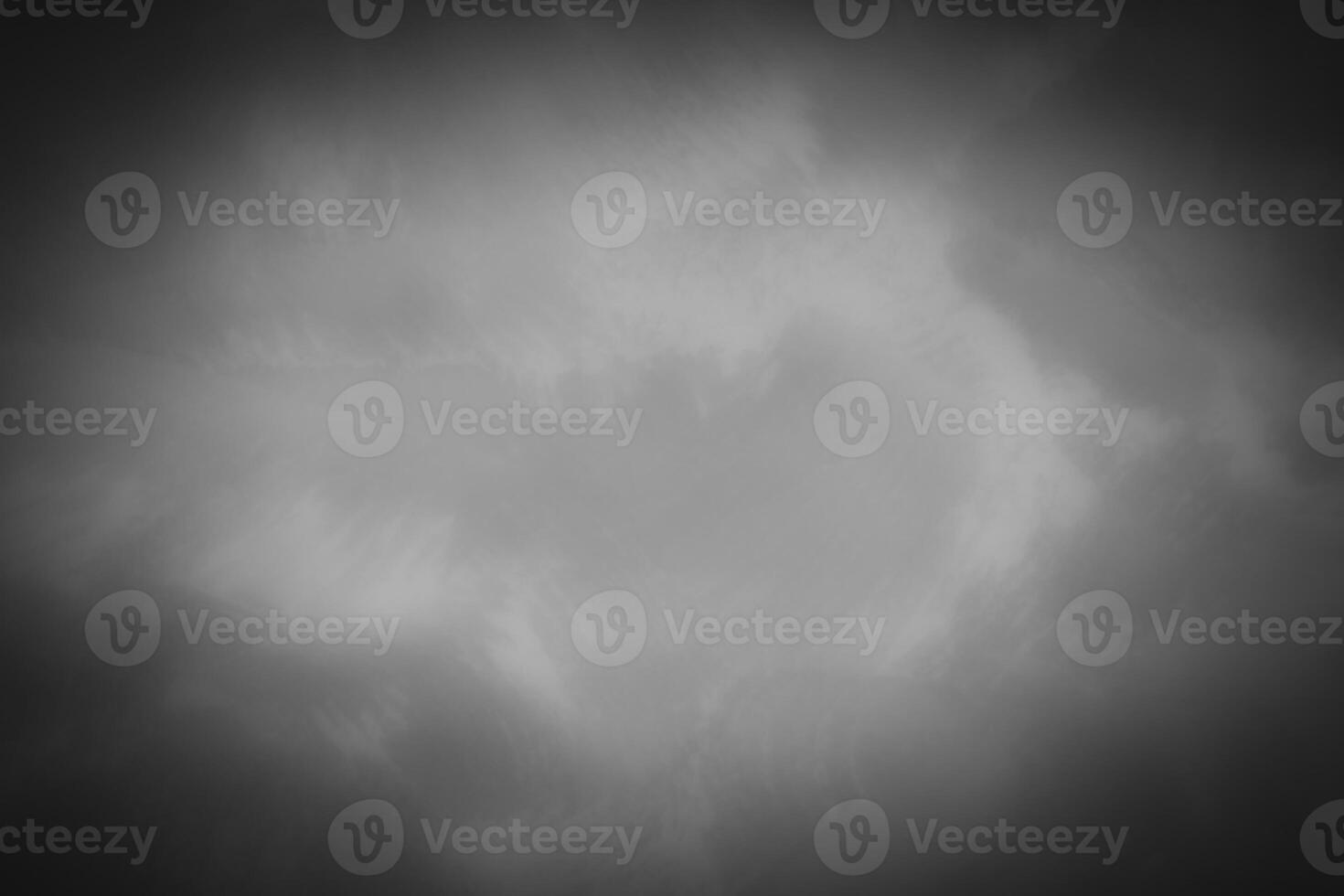 Blured gray decorative plaster or concrete background with vignette. photo
