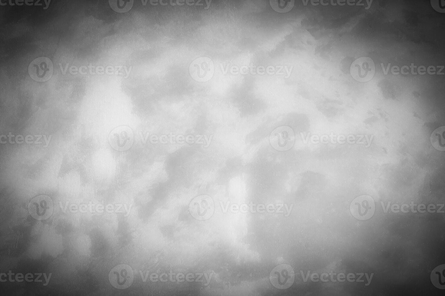Gray decorative plaster or concrete background with vignette. photo