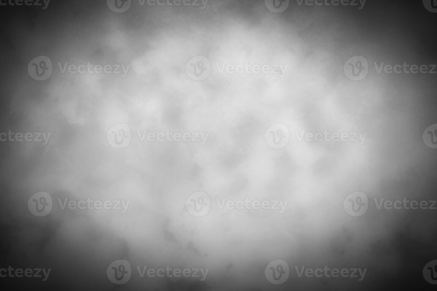 Gray decorative plaster or concrete background with vignette. photo