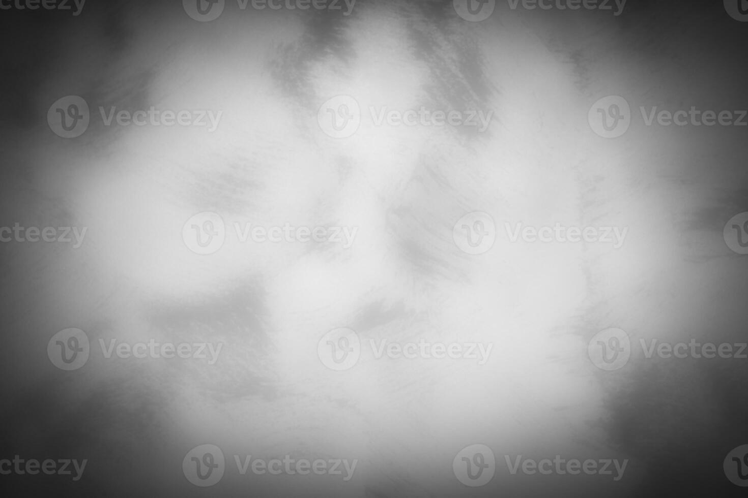 Blured gray decorative plaster or concrete background with vignette. photo
