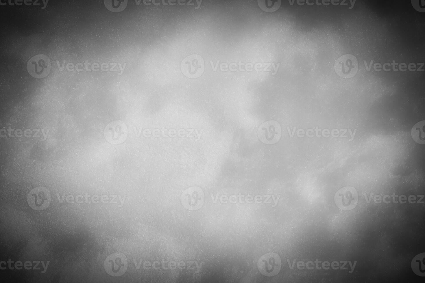 Gray decorative plaster or concrete background with vignette. photo