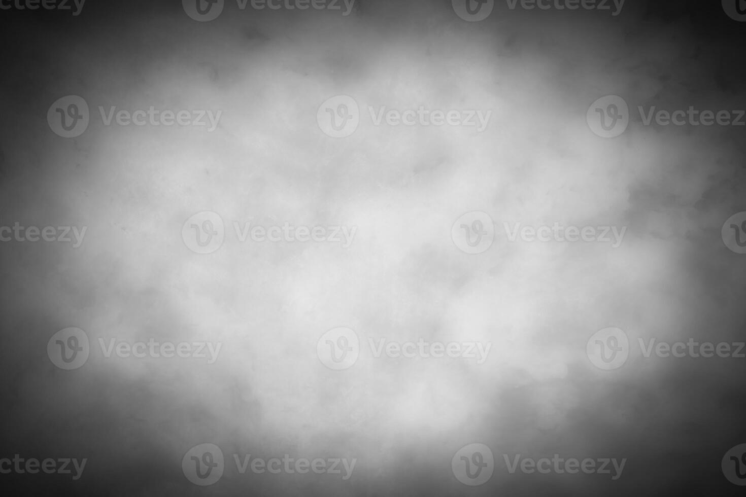 Gray decorative plaster or concrete background with vignette. photo