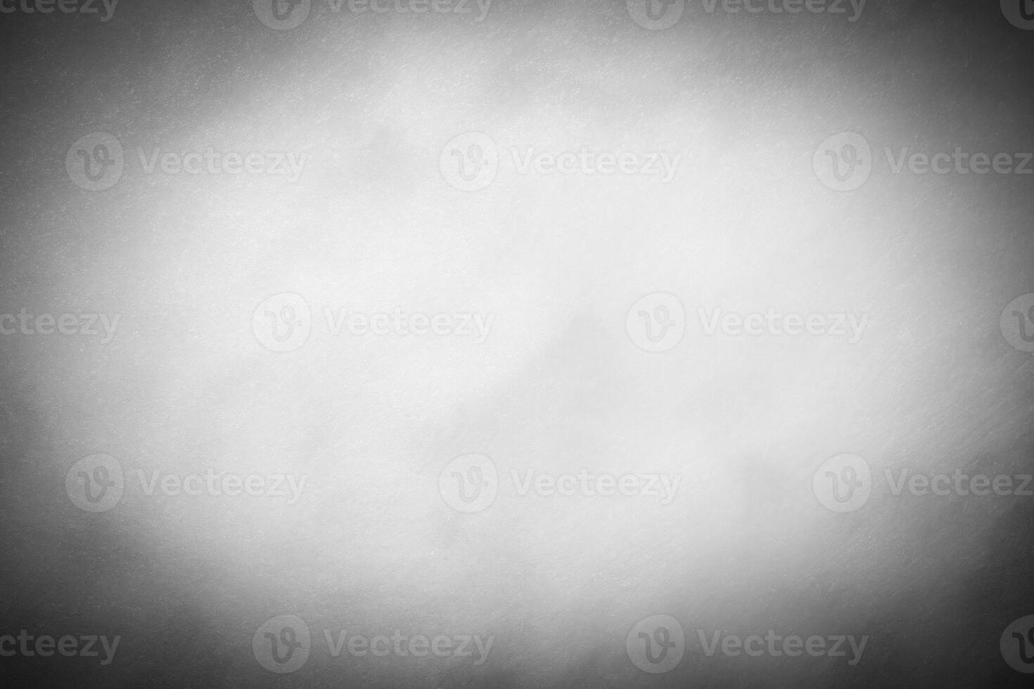 Gray decorative plaster or concrete background with vignette. photo