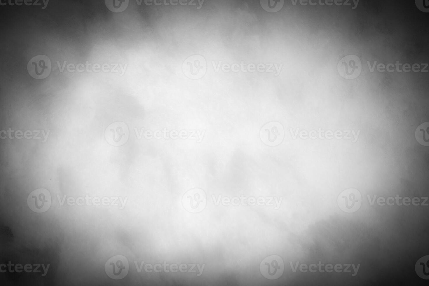 Gray decorative plaster or concrete background with vignette. photo