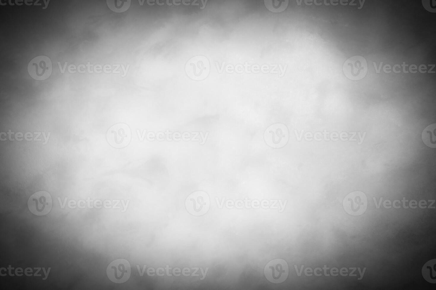 Gray decorative plaster or concrete background with vignette. photo