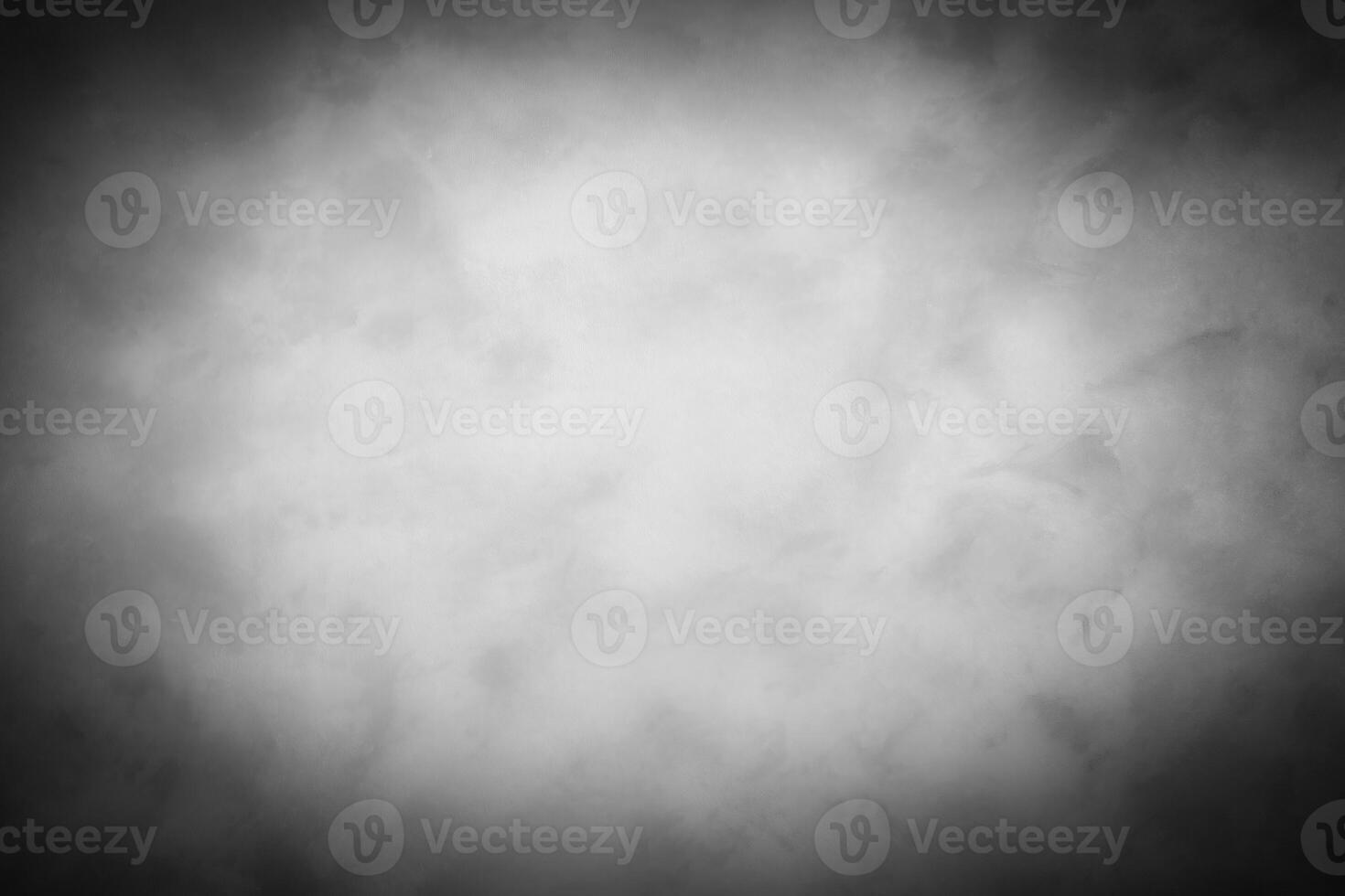 Gray decorative plaster or concrete background with vignette. photo