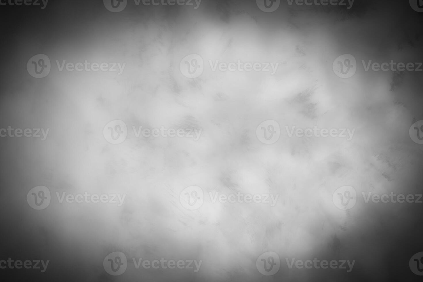 Gray decorative plaster or concrete background with vignette. photo