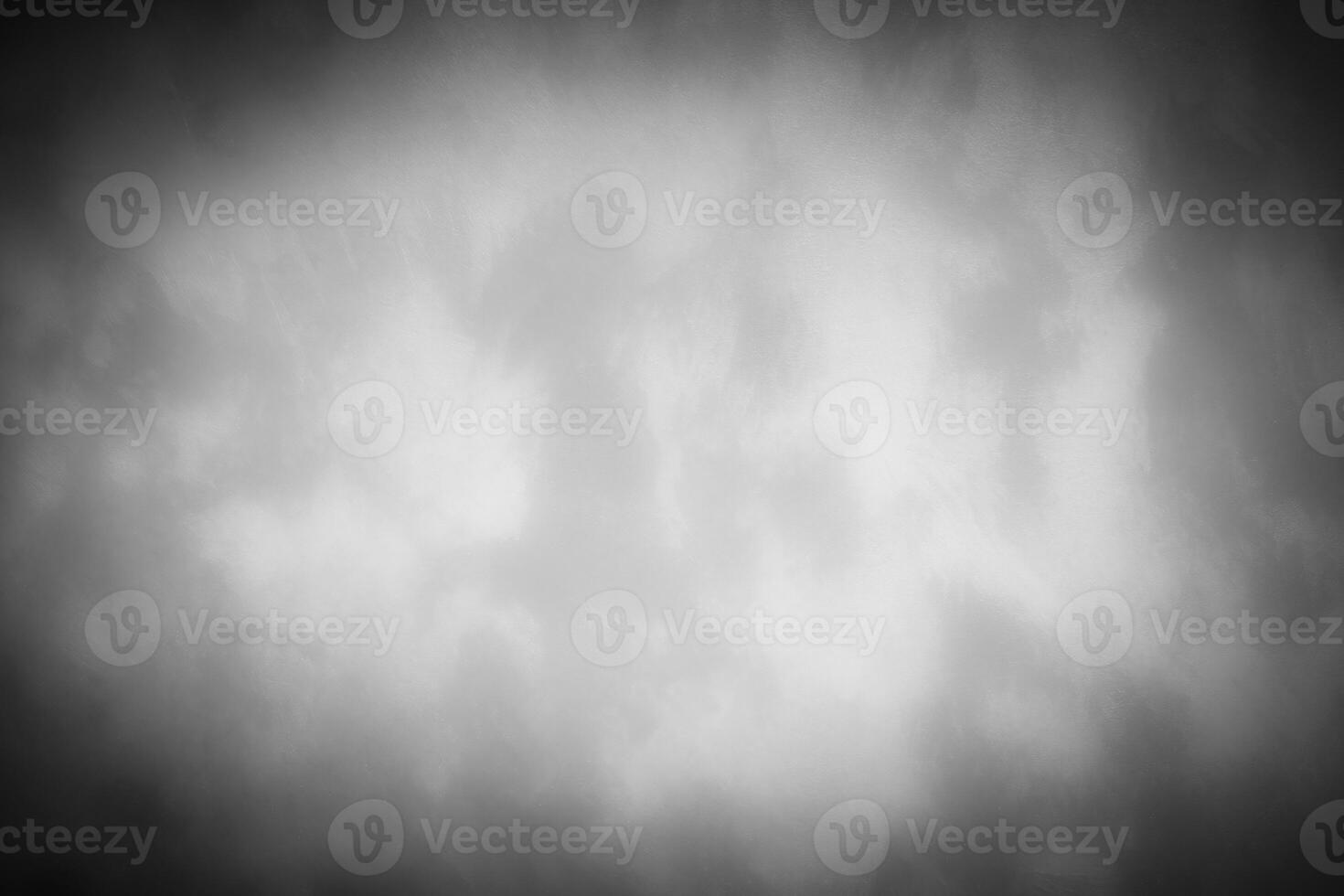 Gray decorative plaster or concrete background with vignette. photo