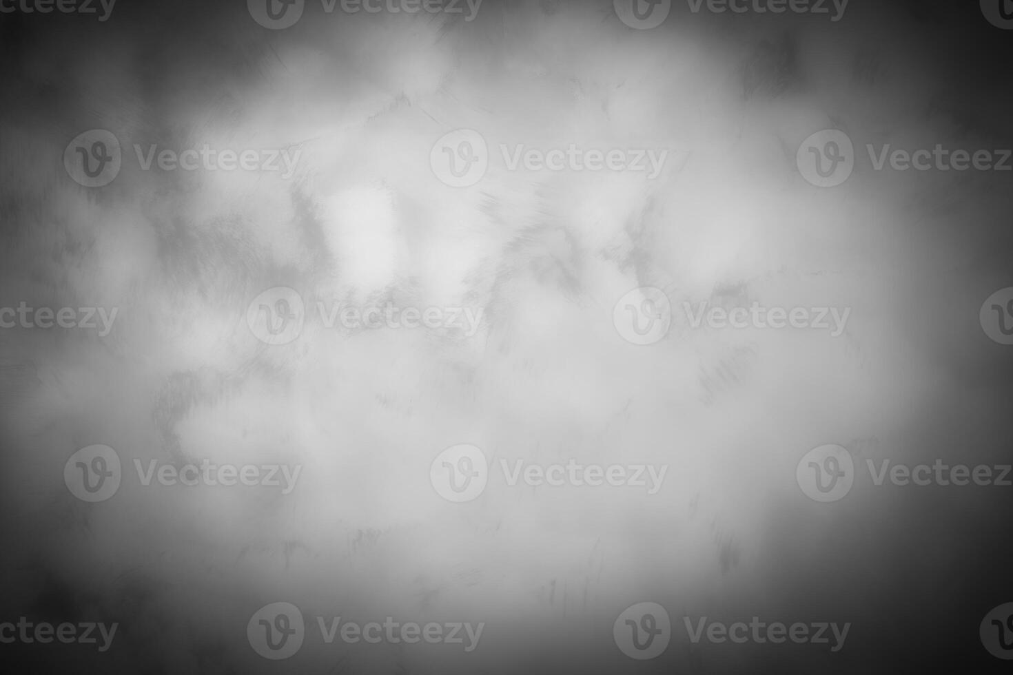Gray decorative plaster or concrete background with vignette. photo