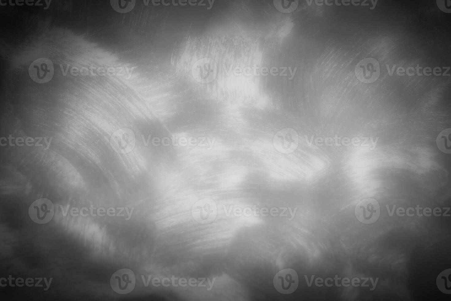 Gray decorative plaster or concrete background with vignette. photo