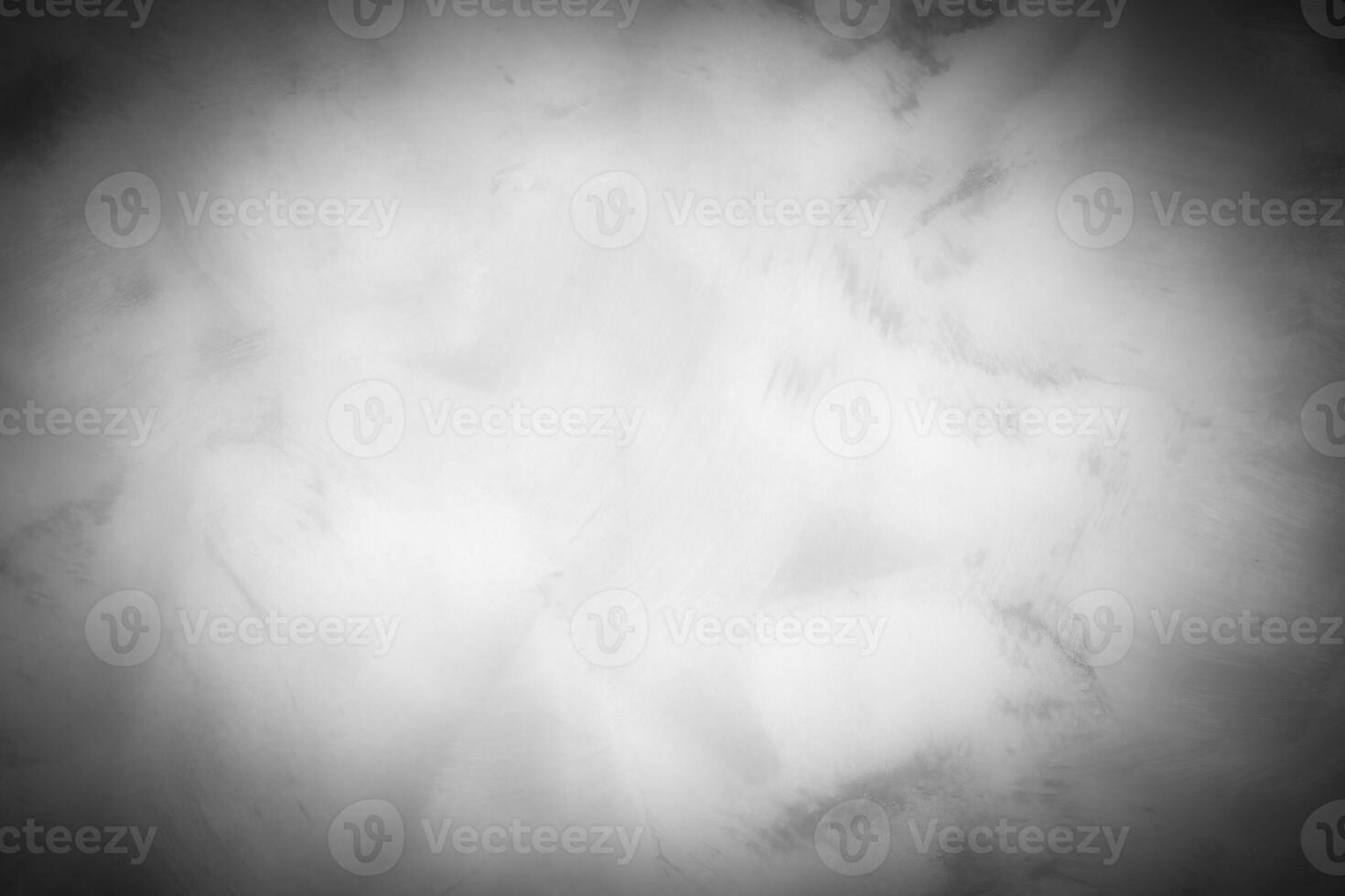 Gray decorative plaster or concrete background with vignette. photo