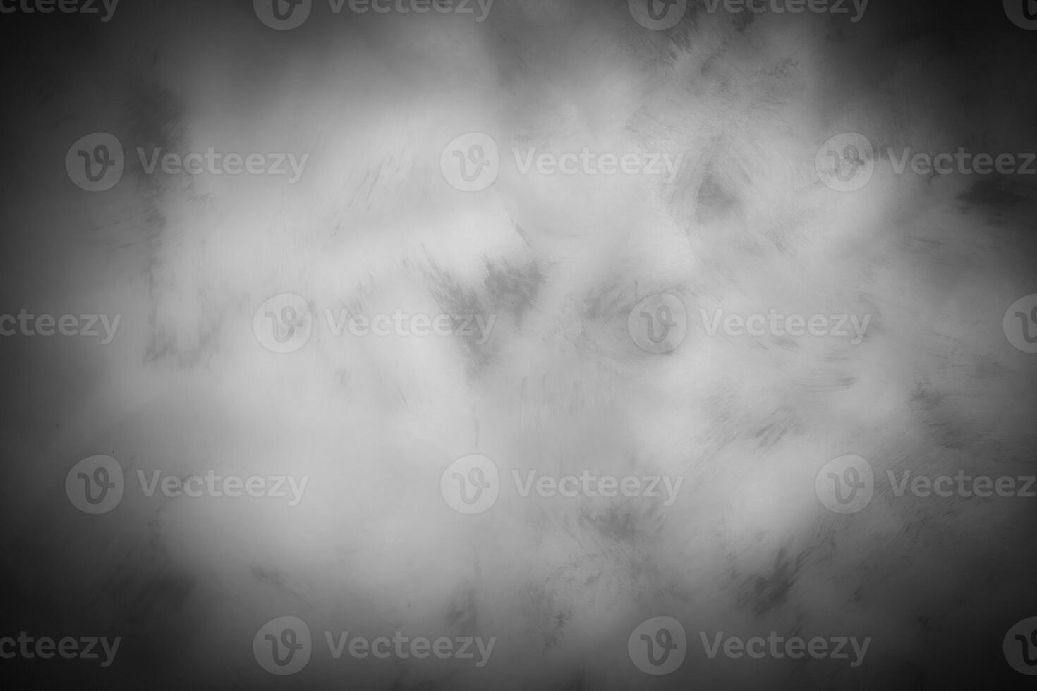 Gray decorative plaster or concrete background with vignette. photo