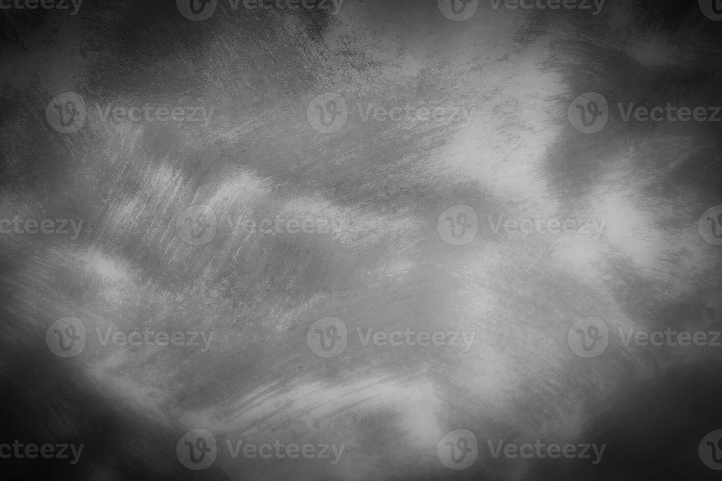 Gray decorative plaster or concrete background with vignette. photo