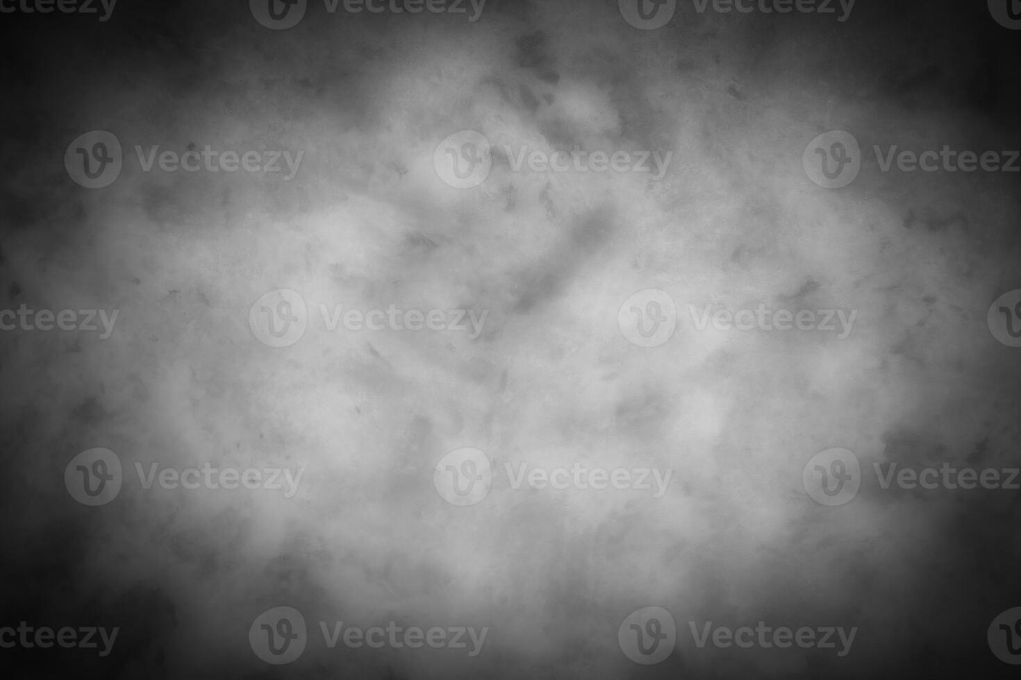 Gray decorative plaster or concrete background with vignette. photo