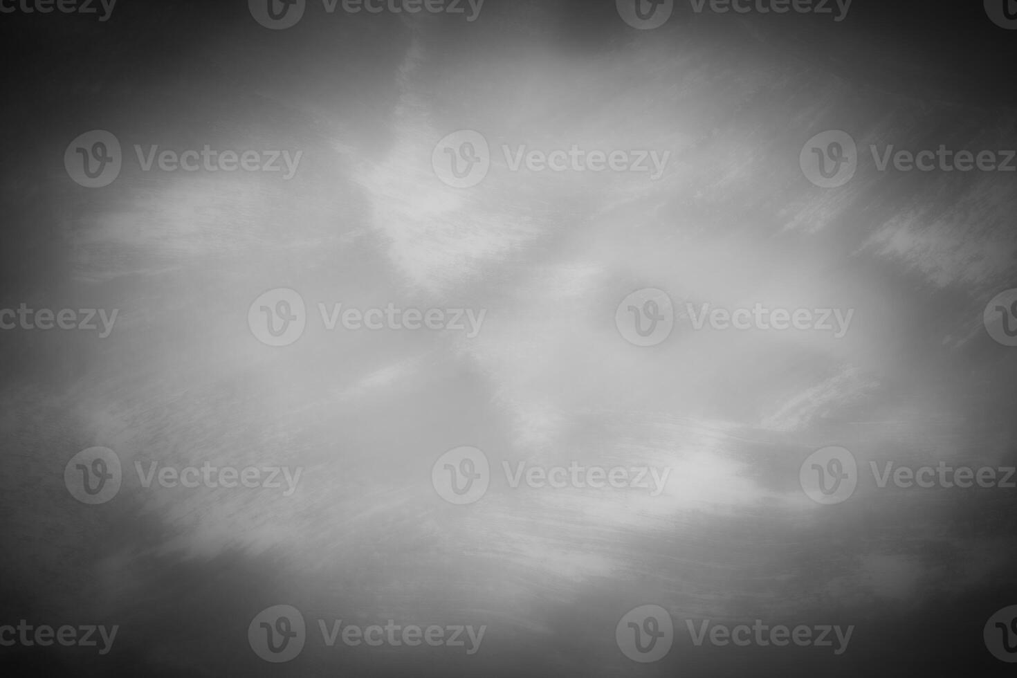 Gray decorative plaster or concrete background with vignette. photo