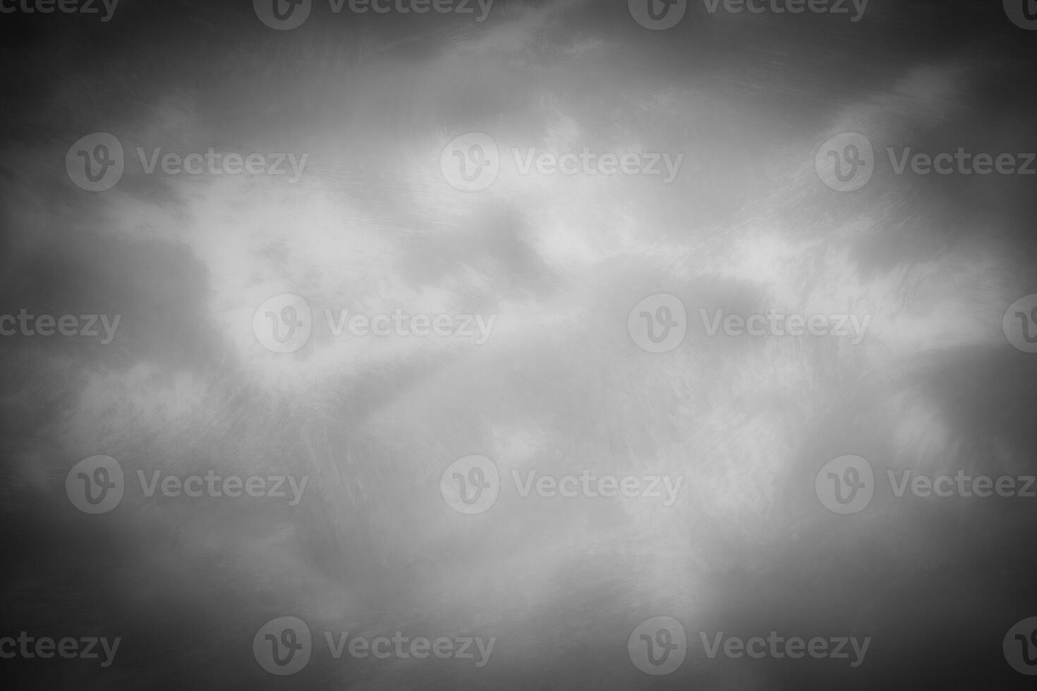 Gray decorative plaster or concrete background with vignette. photo