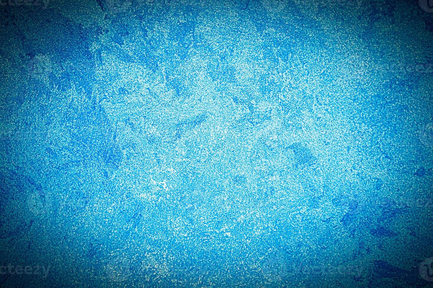 Texture of blue decorative plaster or concrete with vignette. photo