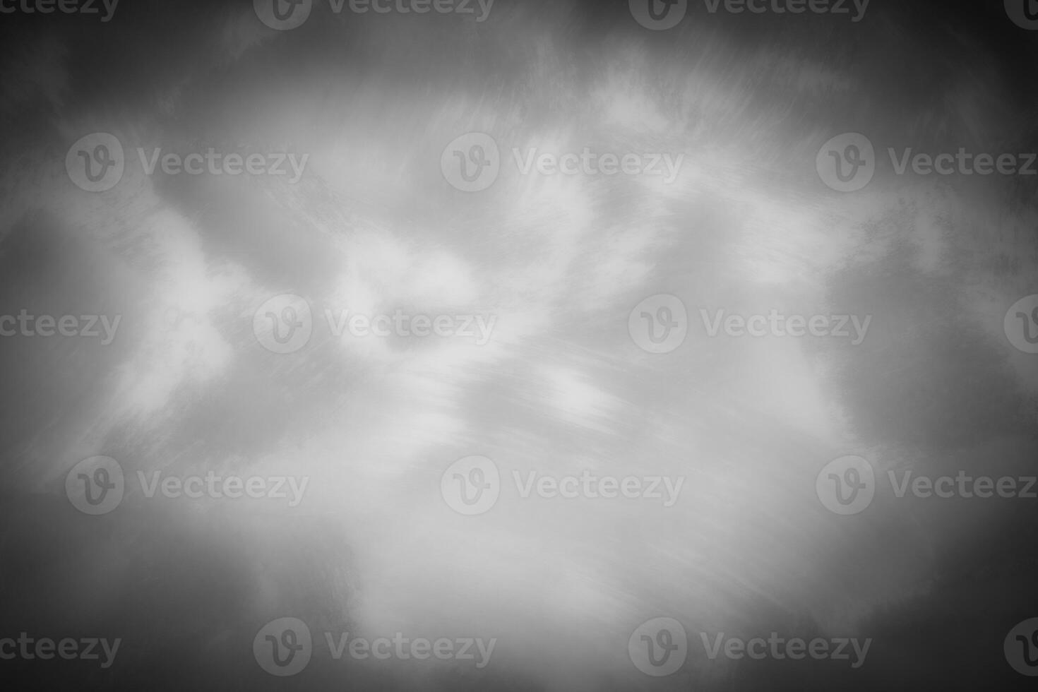 Gray decorative plaster or concrete background with vignette. photo