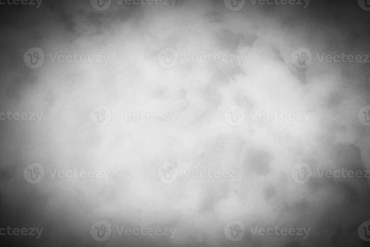 Gray decorative plaster or concrete background with vignette. photo