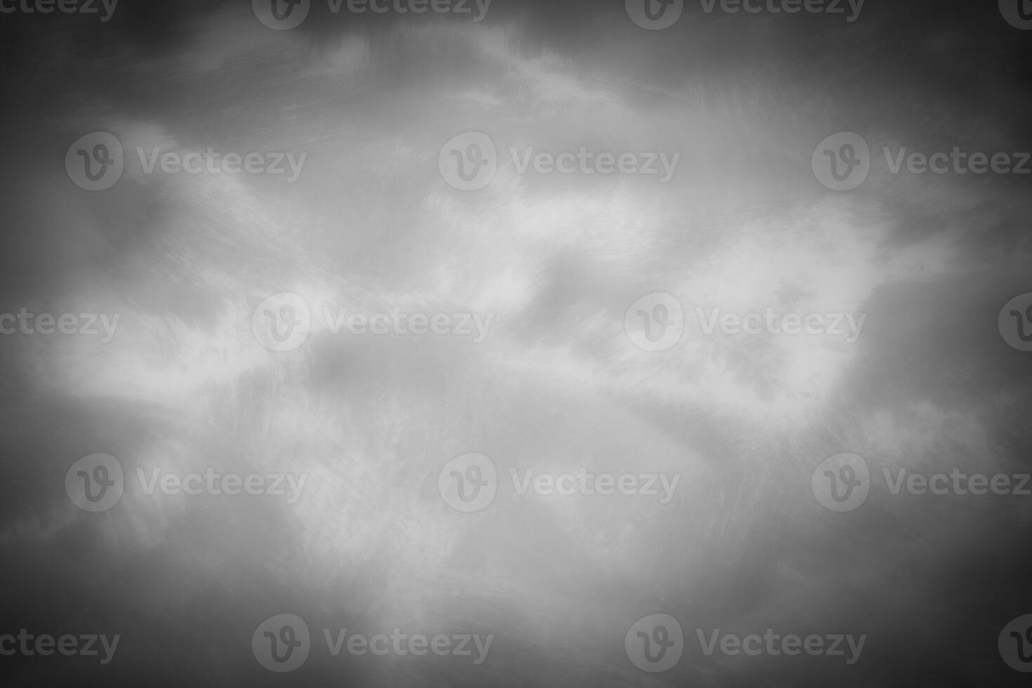 Gray decorative plaster or concrete background with vignette. photo