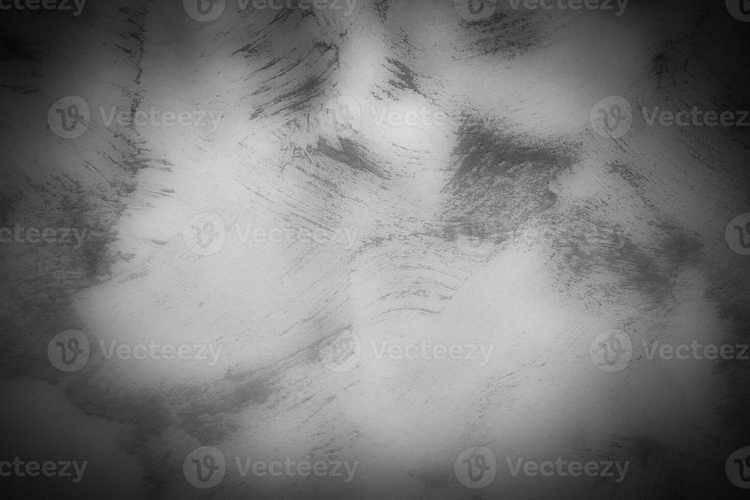 Gray decorative plaster or concrete background with vignette. photo