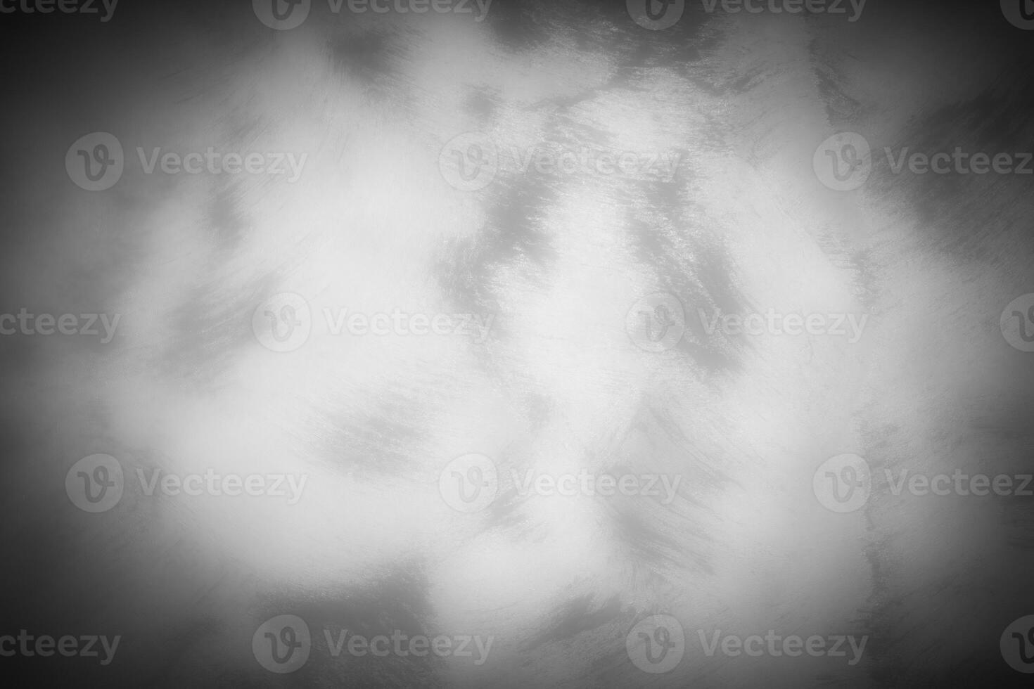 Gray decorative plaster or concrete background with vignette. photo