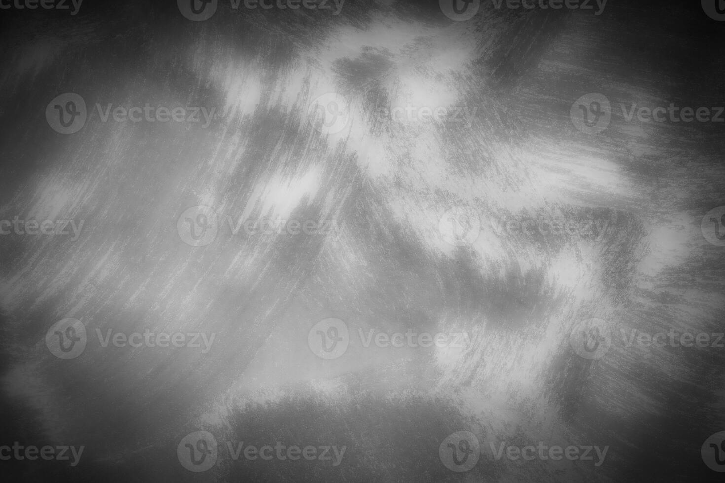 Gray decorative plaster or concrete background with vignette. photo