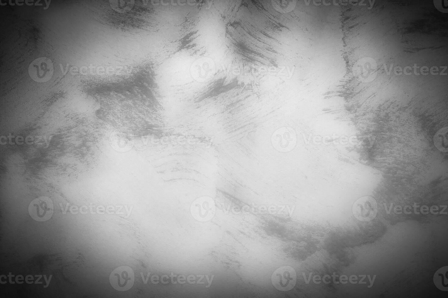 Gray decorative plaster or concrete background with vignette. photo