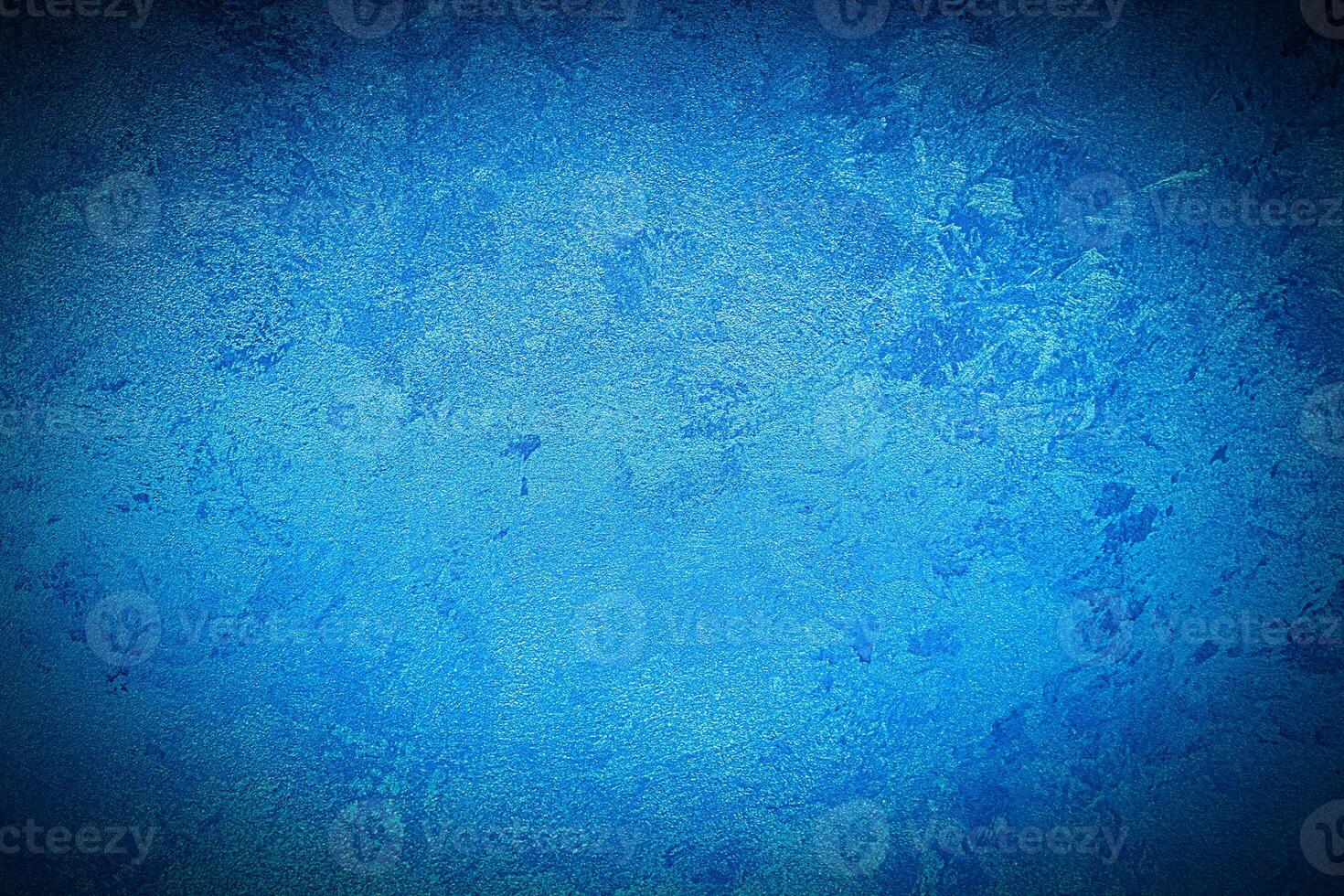 Texture of blue decorative plaster or concrete with vignette. photo