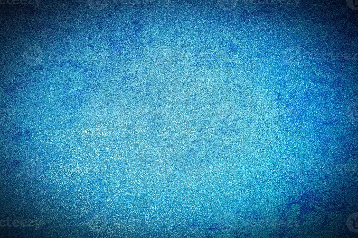 Texture of blue decorative plaster or concrete with vignette. photo