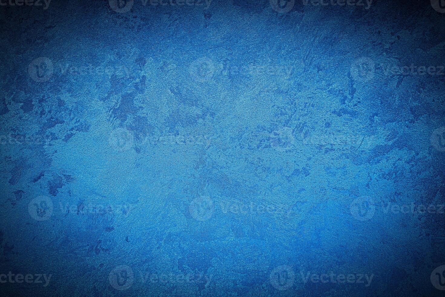 Texture of blue decorative plaster or concrete with vignette. photo