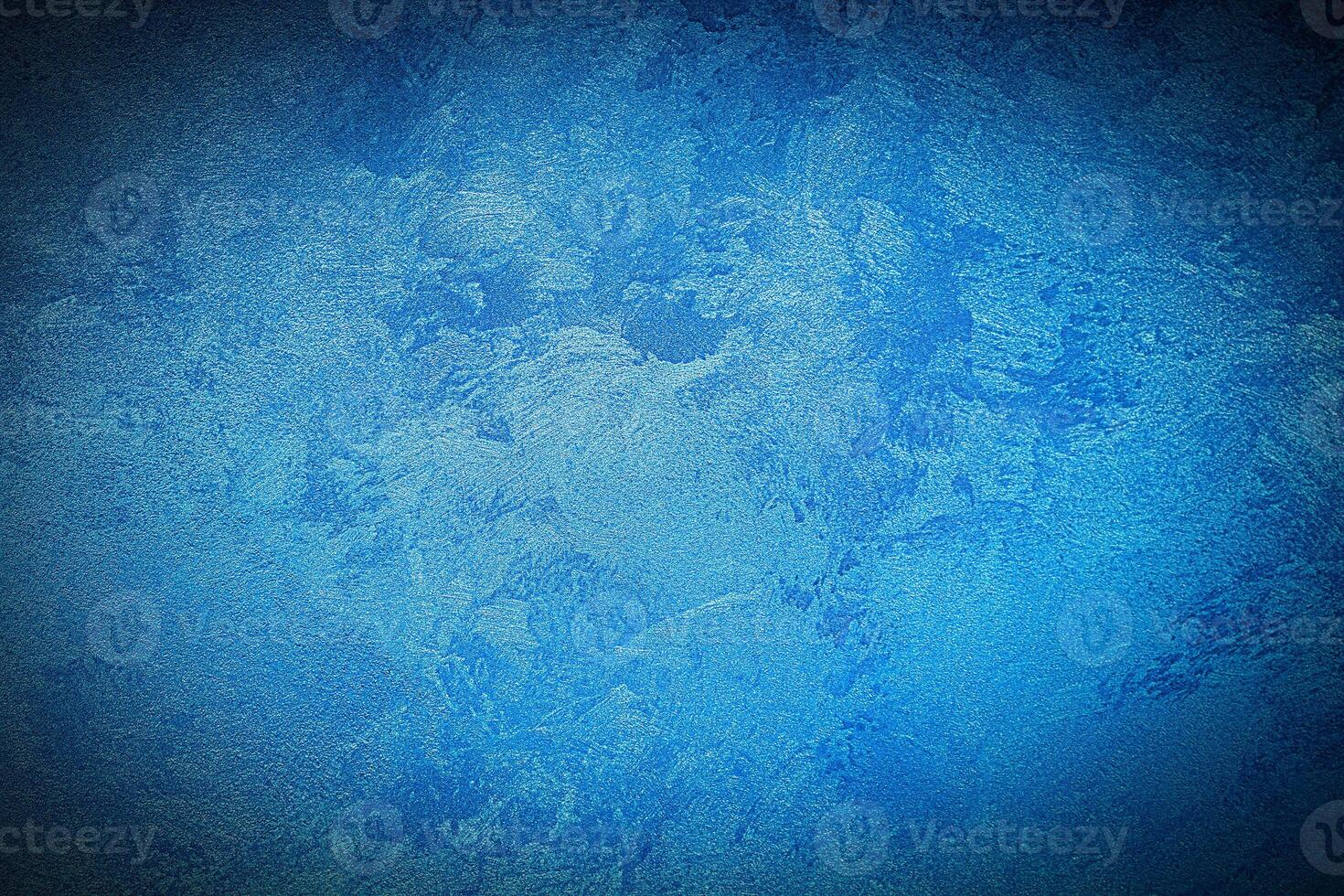 Texture of blue decorative plaster or concrete with vignette. photo