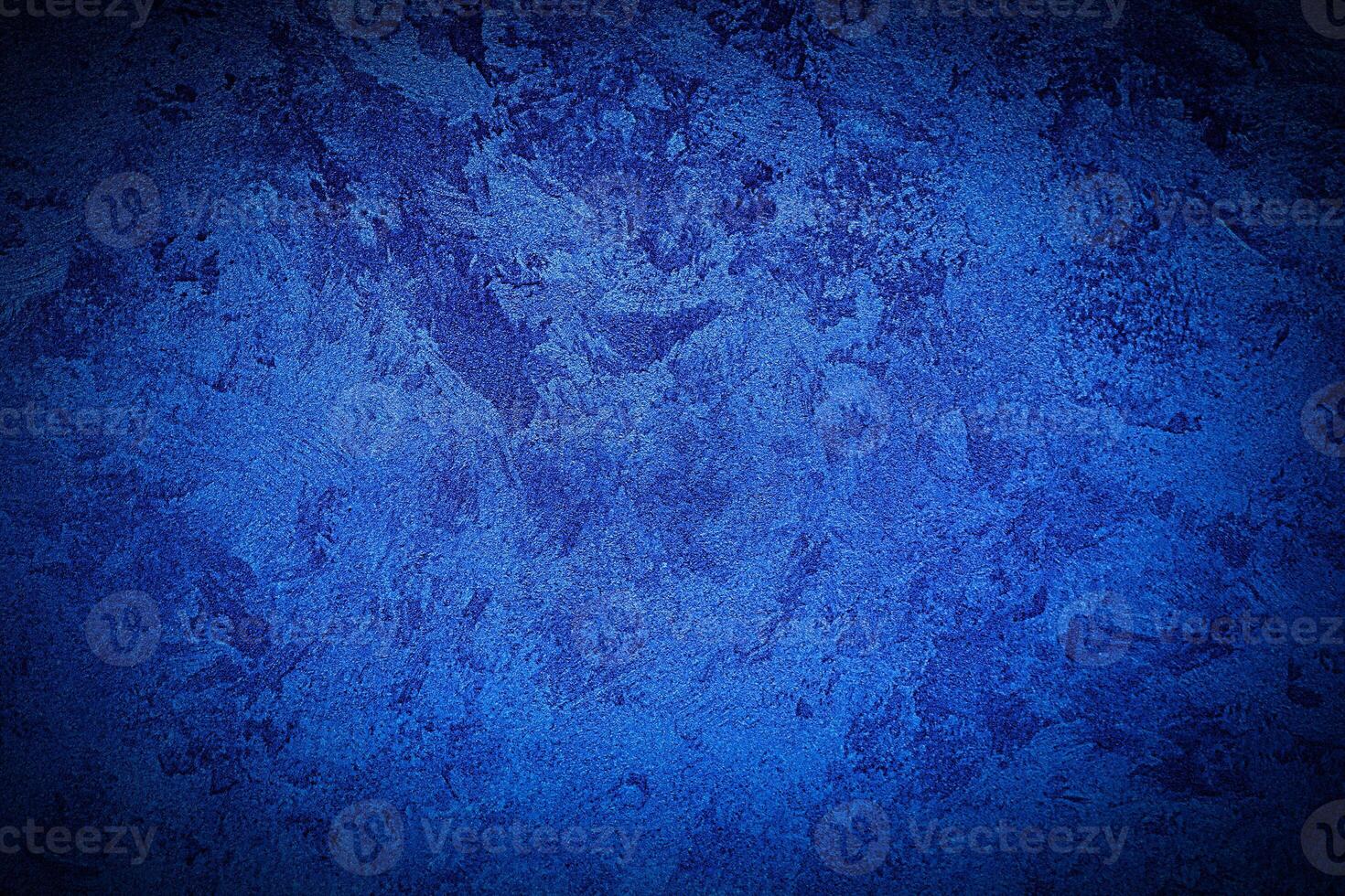 Texture of blue decorative plaster or concrete with vignette. photo