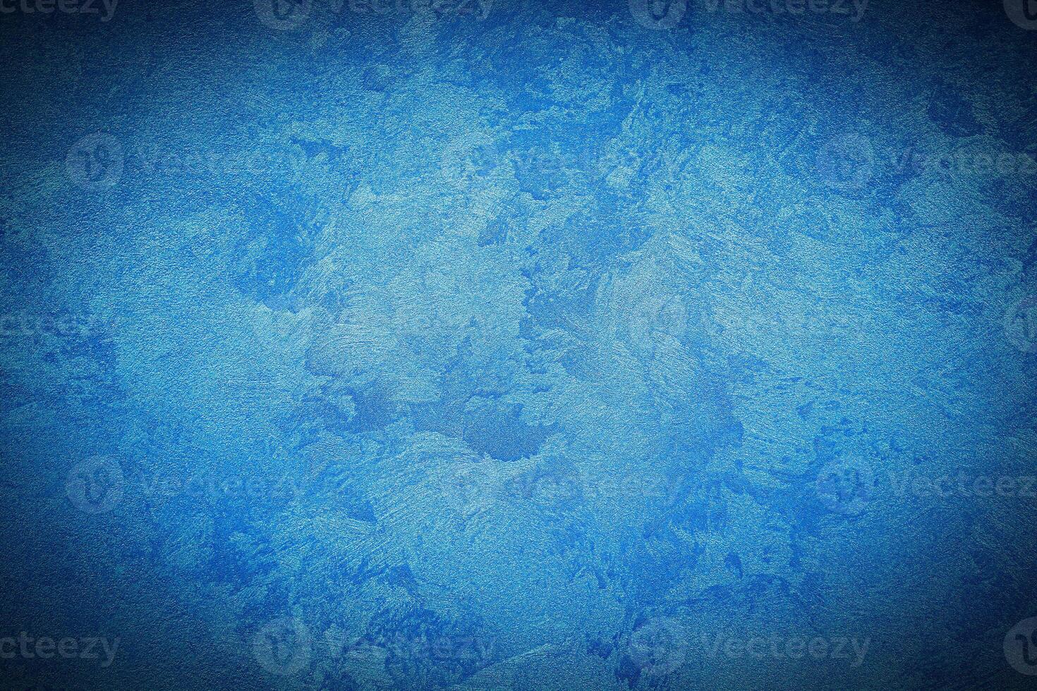 Texture of blue decorative plaster or concrete with vignette. photo