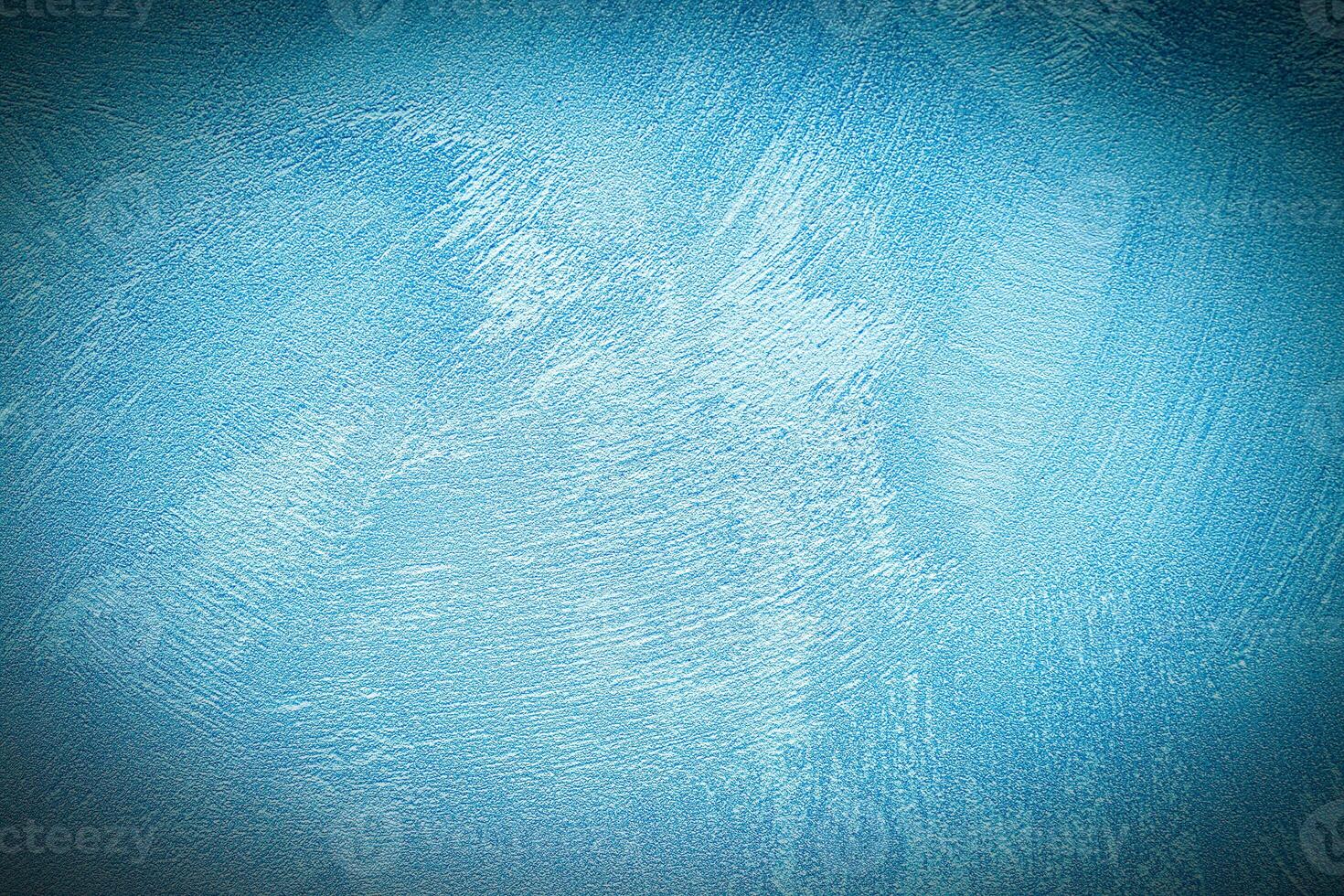 Texture of blue decorative plaster or concrete with vignette. photo