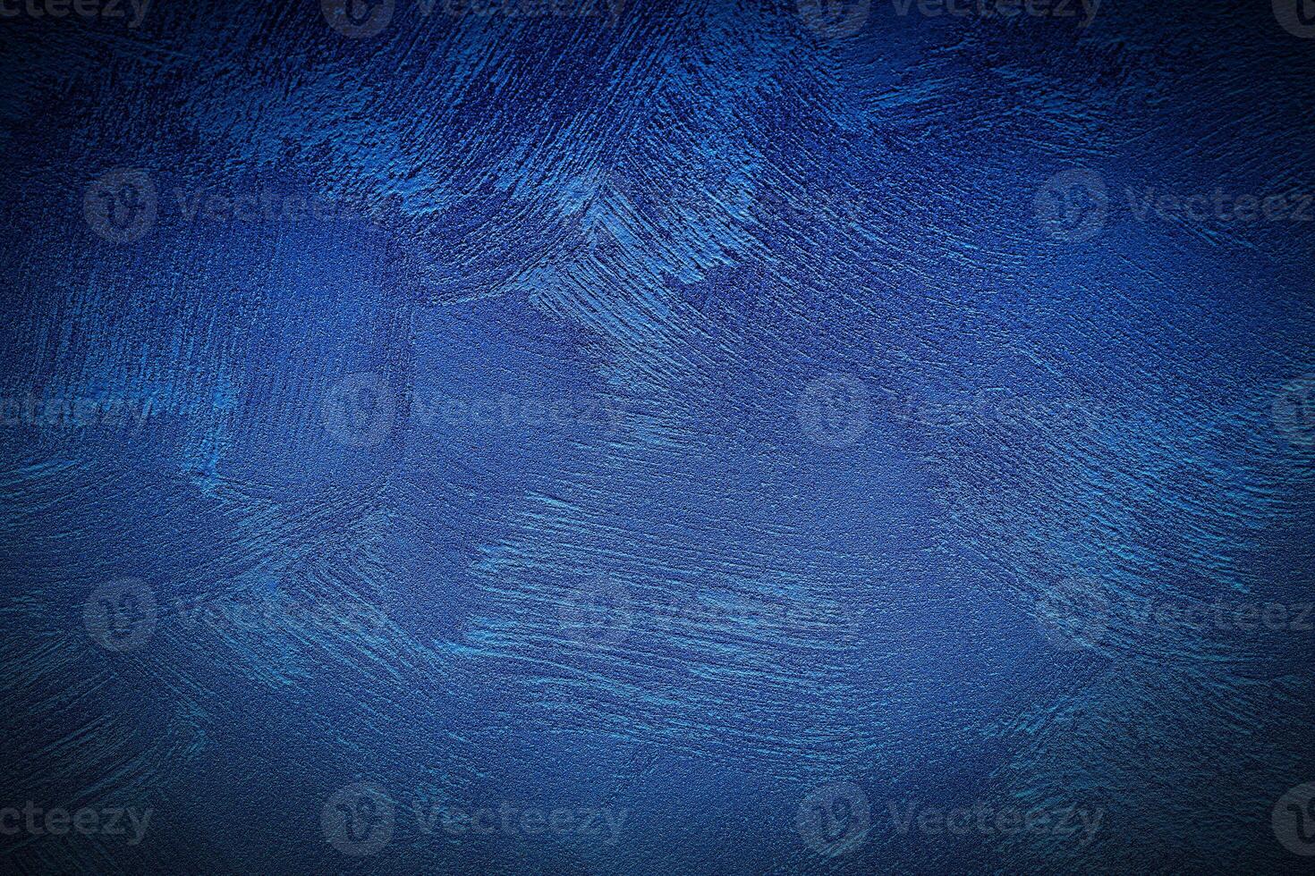 Texture of blue decorative plaster or concrete with vignette. photo