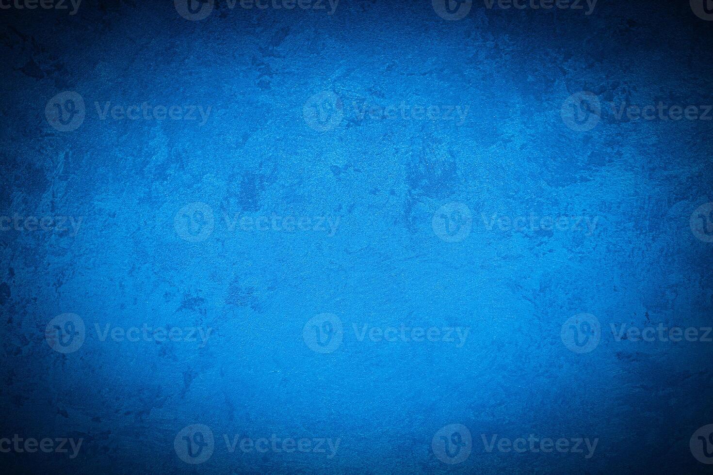 Texture of blue decorative plaster or concrete with vignette. photo
